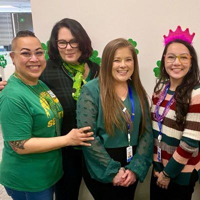 Fedelta Home Care employees pose for a photo during a St. Patrick's networking event