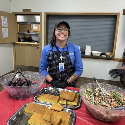woman serving food